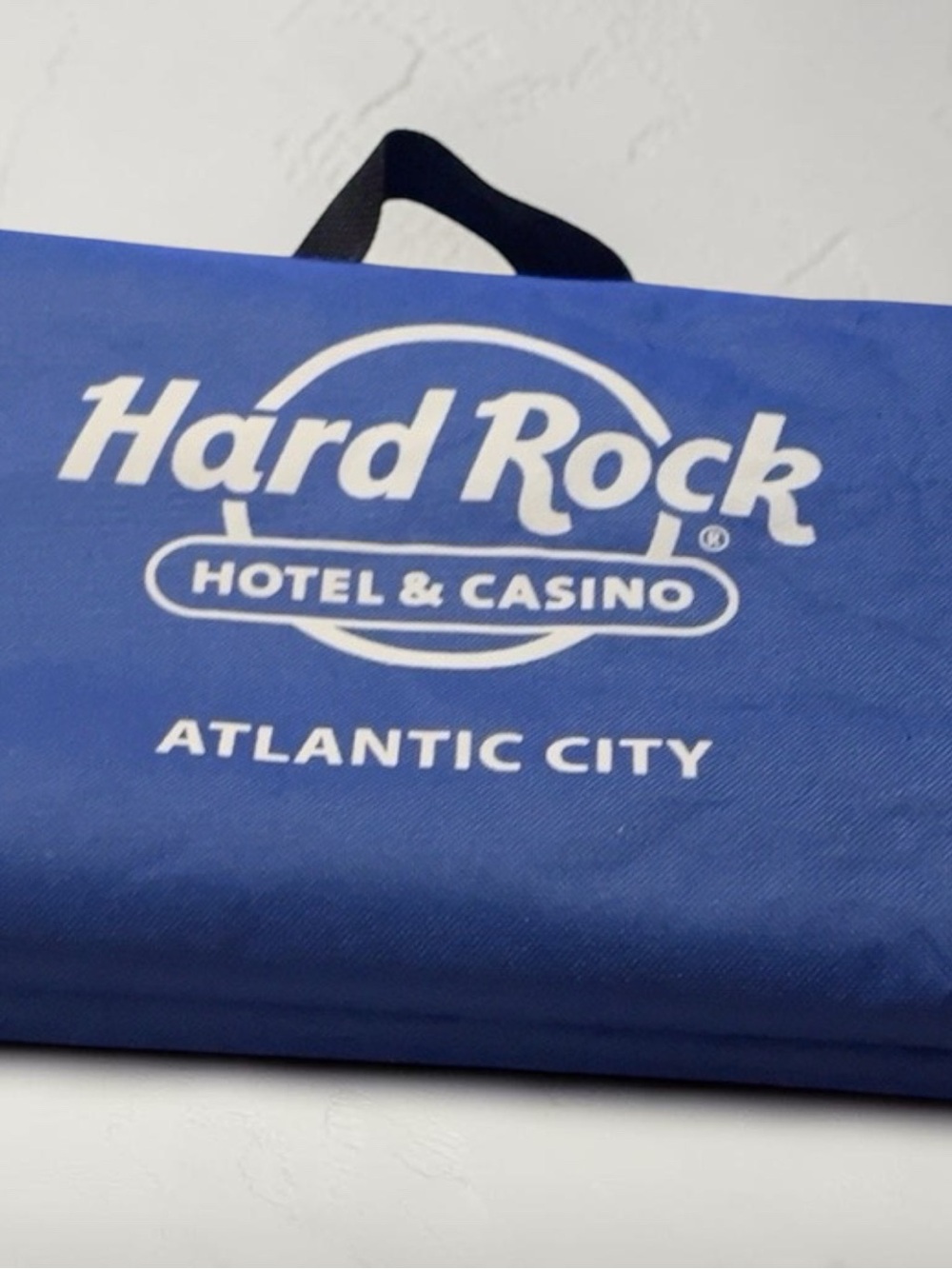 Hard Rock Cafe Cream Folding Bench with Blue Accents